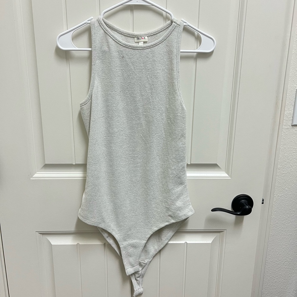 NWT- White and silver sparkle body suit